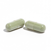 Two green capsules on a white background.  Nature's Treasure Vegetables + Daily Food Supplement.  Consult Health by Dr Terry Dubrow and Heather Dubrow.  