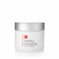 Skincare cream jar with silver lid on a white background